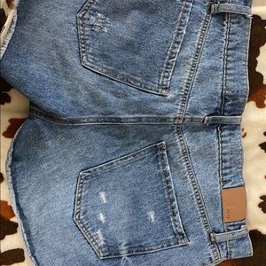 Distressed denim shorts